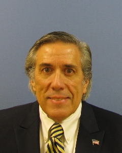 Daniel          E. Adamus